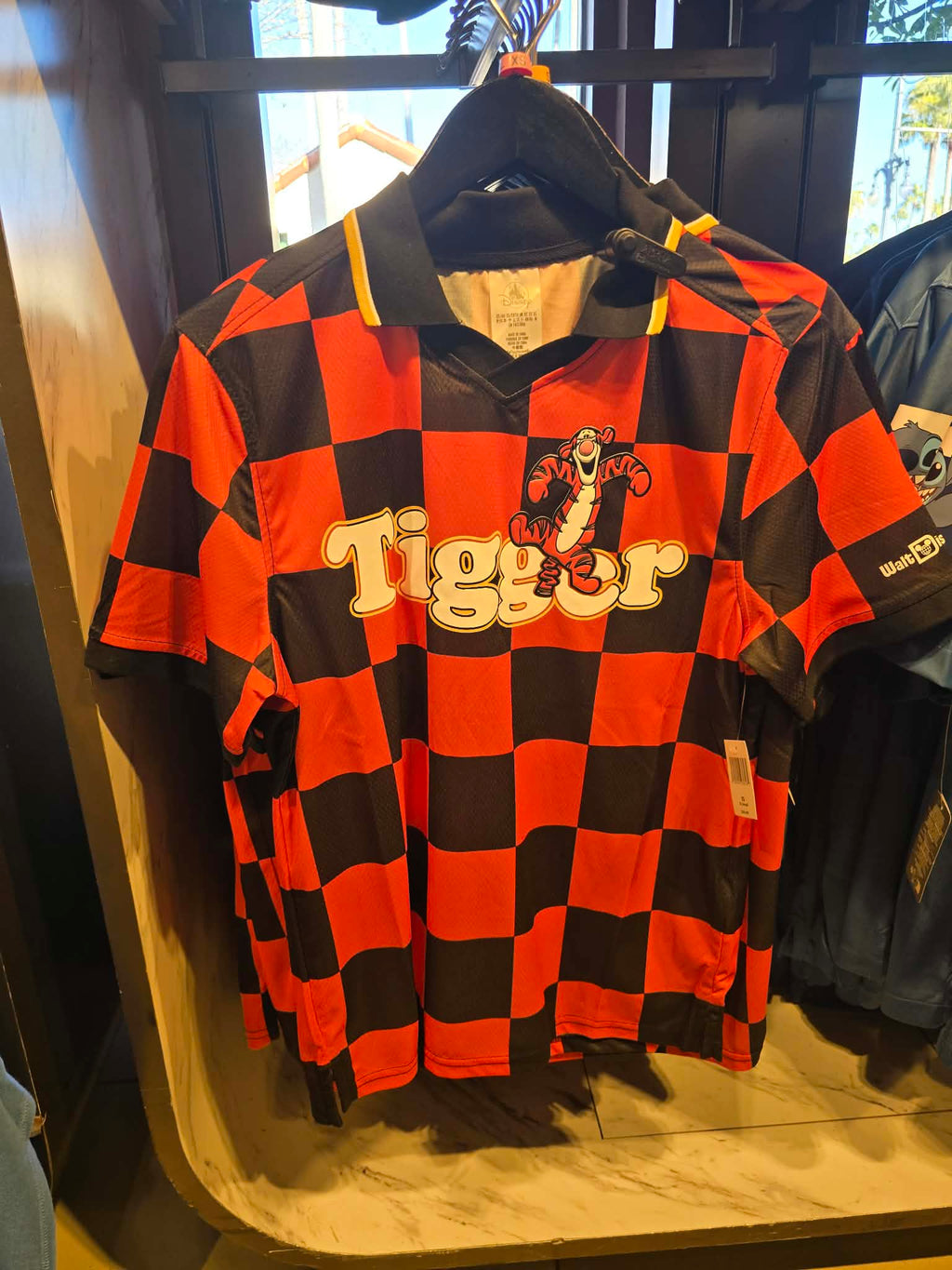 Disney Parks Tigger Football Jersey Featuring Black & Orange Checkerboard Pattern and V-Neck Collar