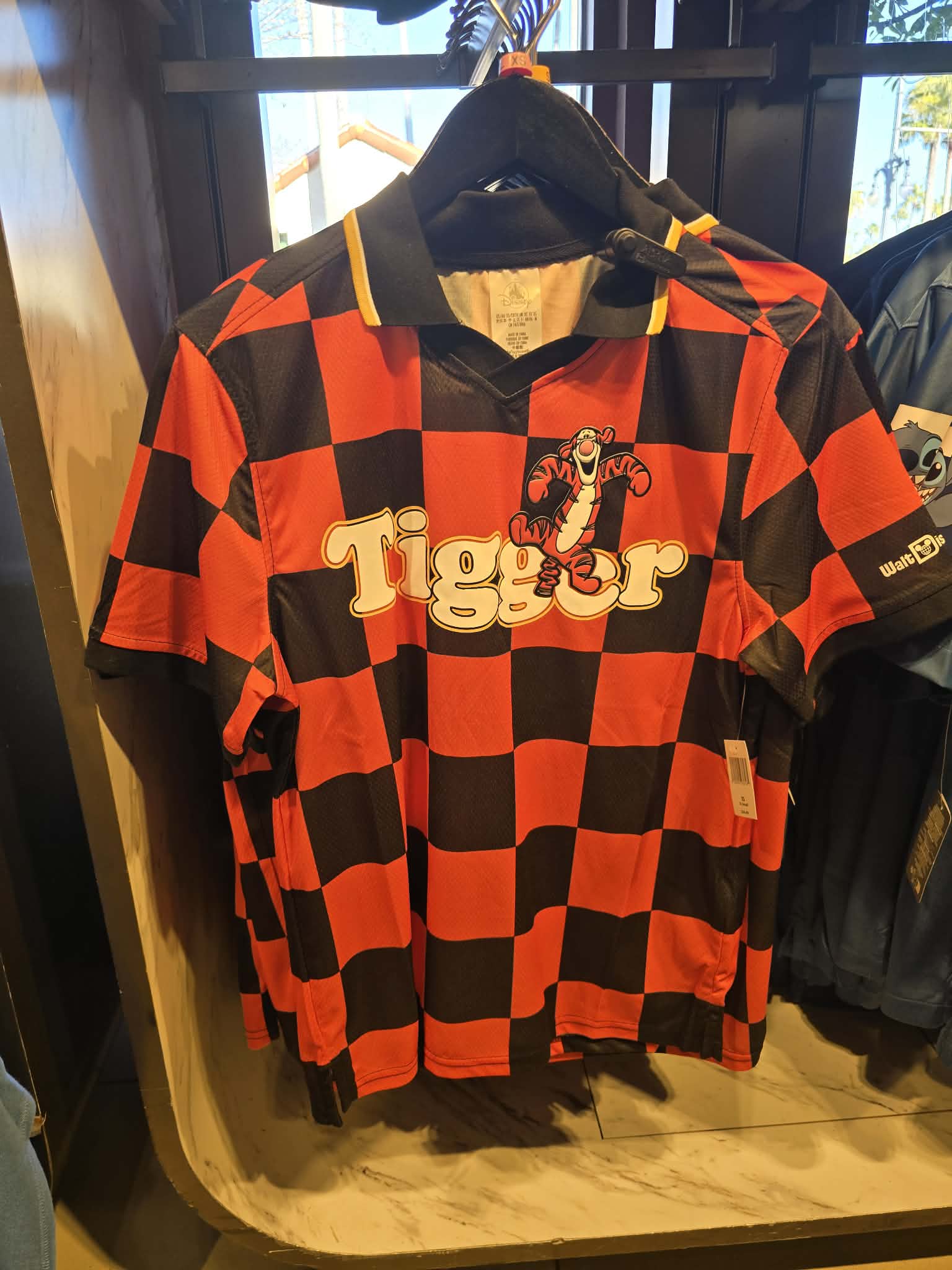 Disney Parks Tigger Football Jersey Featuring Black & Orange Checkerboard Pattern and V-Neck Collar
