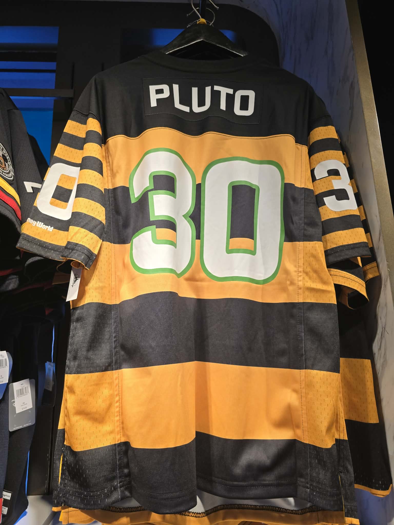 Disney Parks Pluto Jersey Featuring Black & Yellow Stripes and Embroidered Logo
